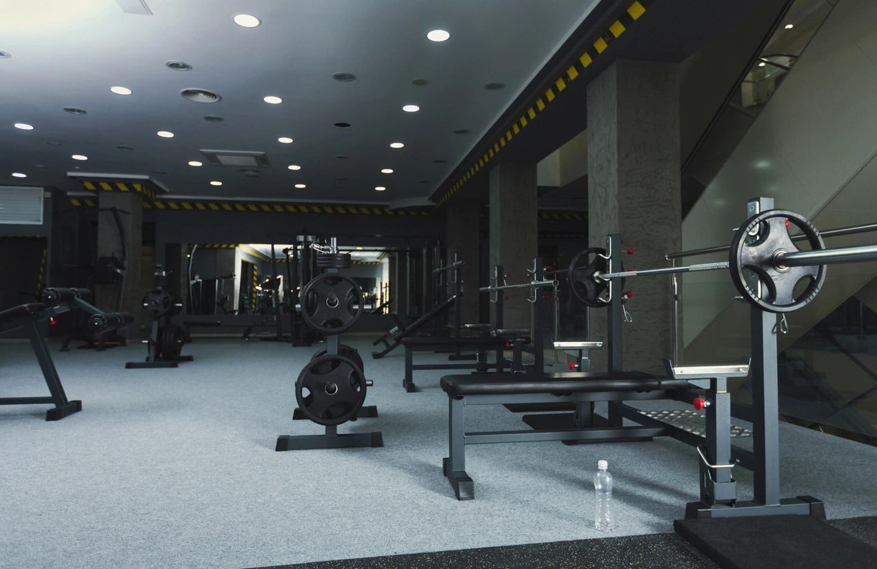 Gym Interior With Weightlifting